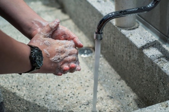 Handen wassen Corona